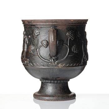 Ivar Johnsson, a pair of Swedish Grace cast iron garden urns 'Diana', Näfveqvarn, Sweden.