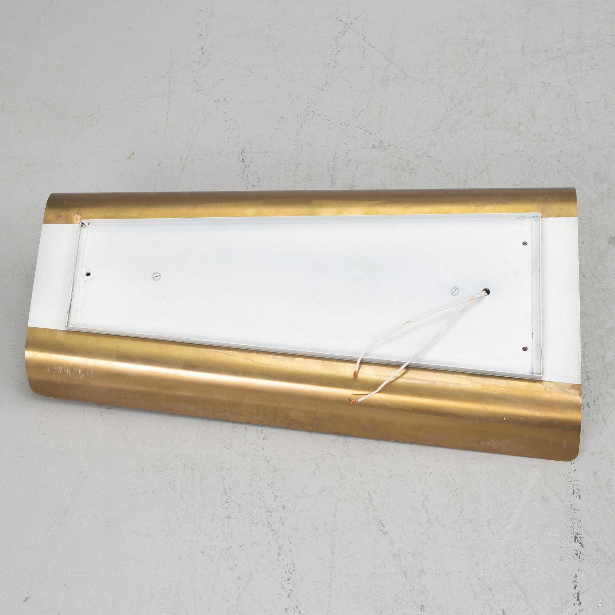 A Swedish Modern brass wall light, 1940's/50's.