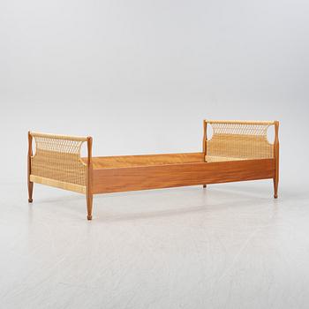 A model 960 mahogany and rattan bed by Josef Frank for Firma Svenskt Tenn, designed 1939.