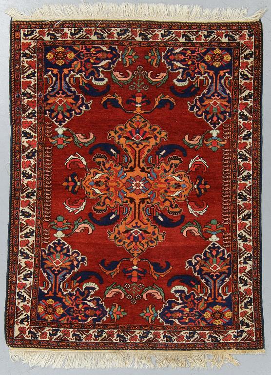 A rug, semi-antique Hamadan, ca 140 x 110 cm.