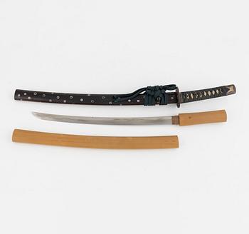 Wakizashi, mumei, from Japan in shirasaya with koshirae.