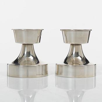 A pair of Swedish silver candlesticks, mark of company MGAB, Uppsala 1974.