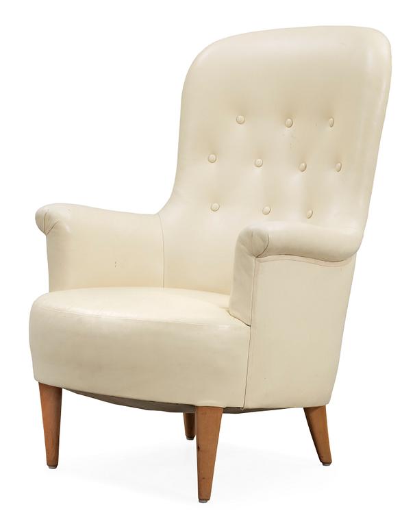 A Carl Malmsten 'Marino' white leather easy chair.