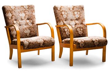 Ilmari Tapiovaara, A PAIR OF EASY CHAIRS. Ilmari Tapiovaara. Asko 1938.