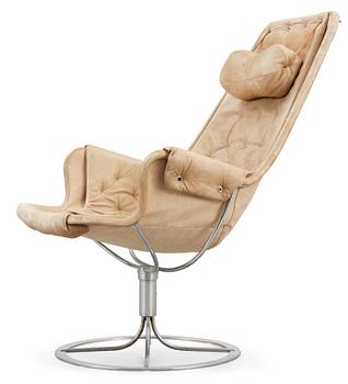 610. A Bruno Mathsson beige leather and chromed steel 'Jetson' easy chair, DUX.