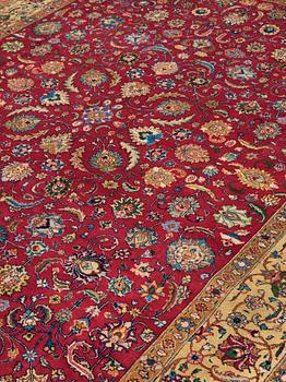 A CARPET, A semi-antique Tabriz, ca 374 x 283 cm.