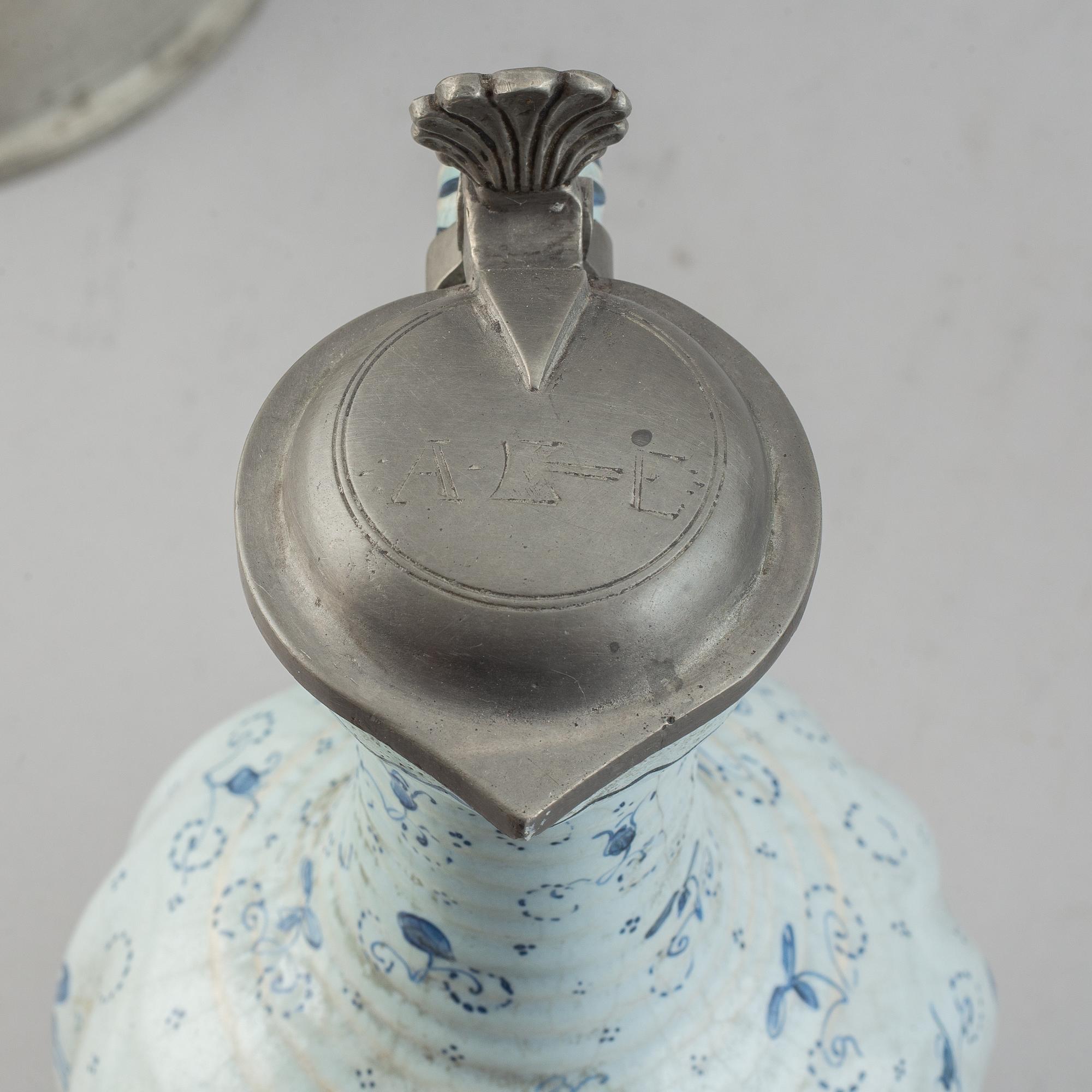 A group of three pewter and faience ewers, Holland/Germany, 18th/19th Century.