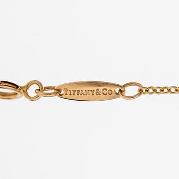 Tiffany & Co, Elsa Peretti, collier, "Diamonds by the Yard", 18K guld med en diamant ca 0.05 ct.