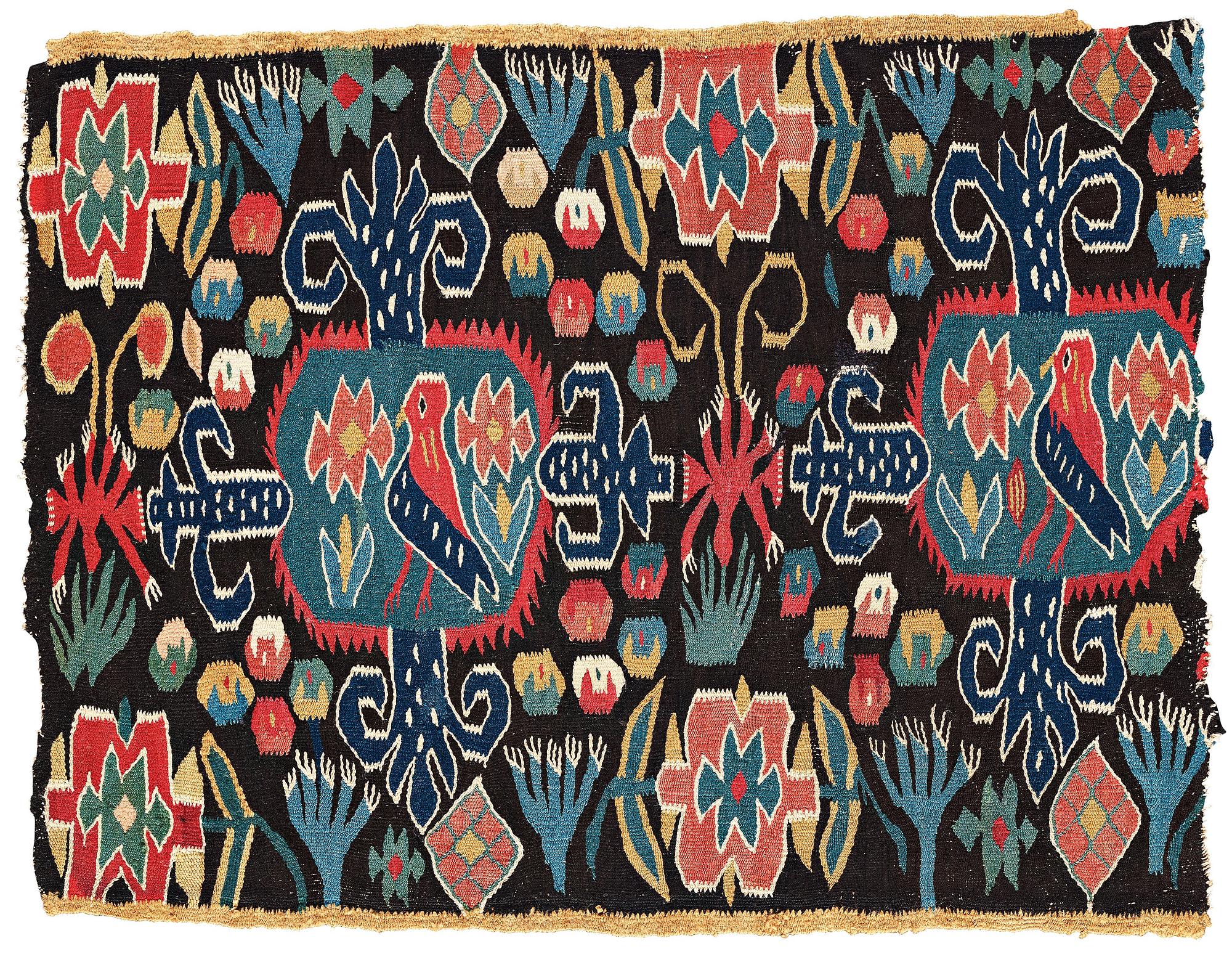 A CARRIAGE CUSHION FRAGMENT, tapestry weave, "Den innelykta fågeln", ca 52 x 67 cm, Scania (Sweden).