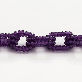 A necklace with amethysts.