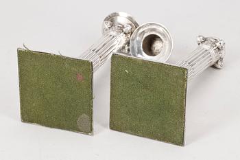 LJUSSTAKAR, ett par, nysilver, 1800-tal.