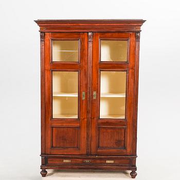 A display cabinet around 1900.