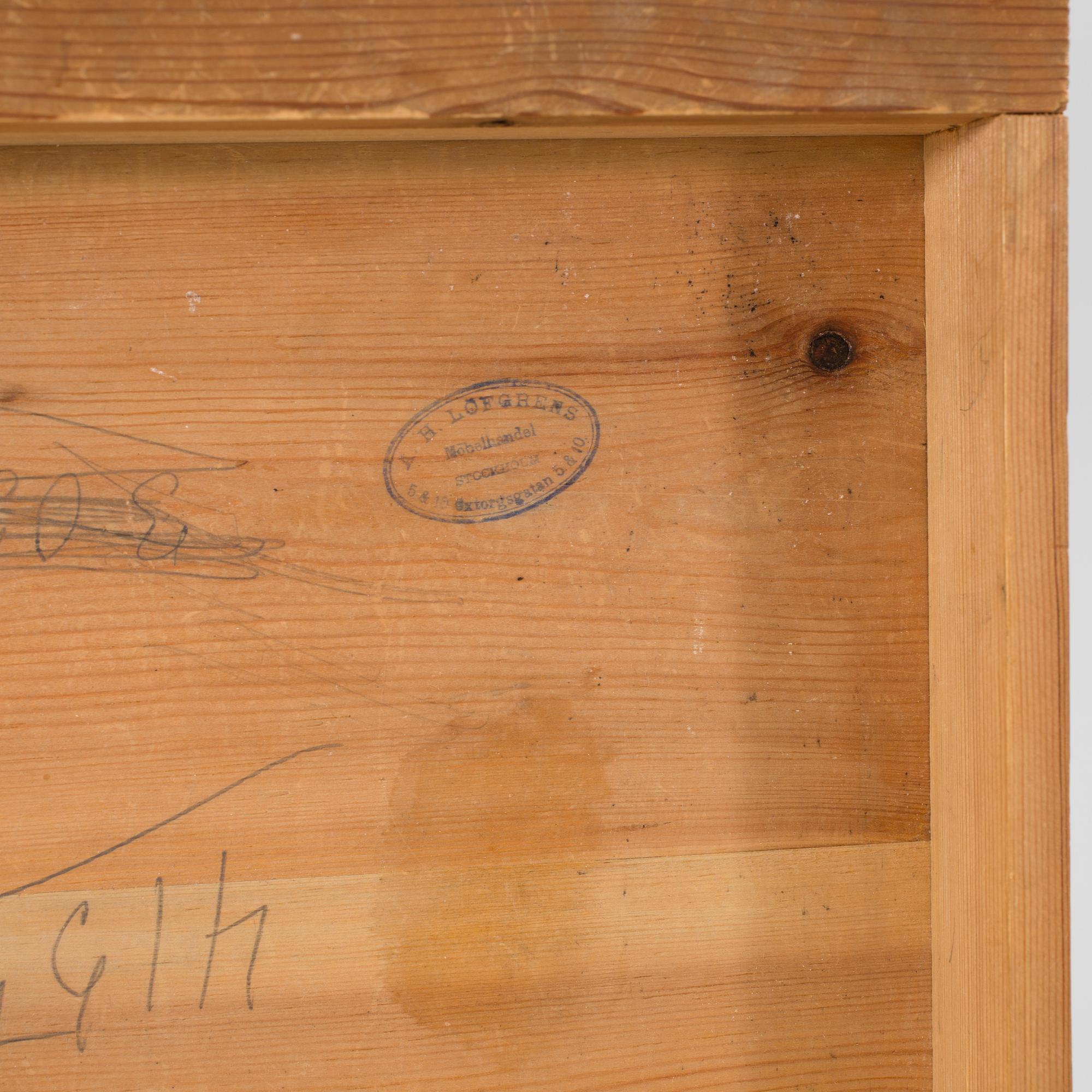 A walnut and mahogany bedside table, late 19th Century.