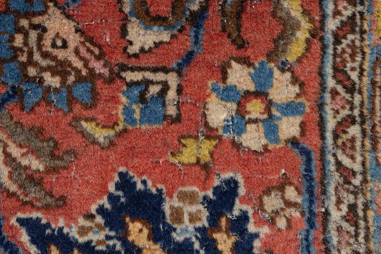 A semi antique Tabriz carpet, c. 290 x 195 cm.