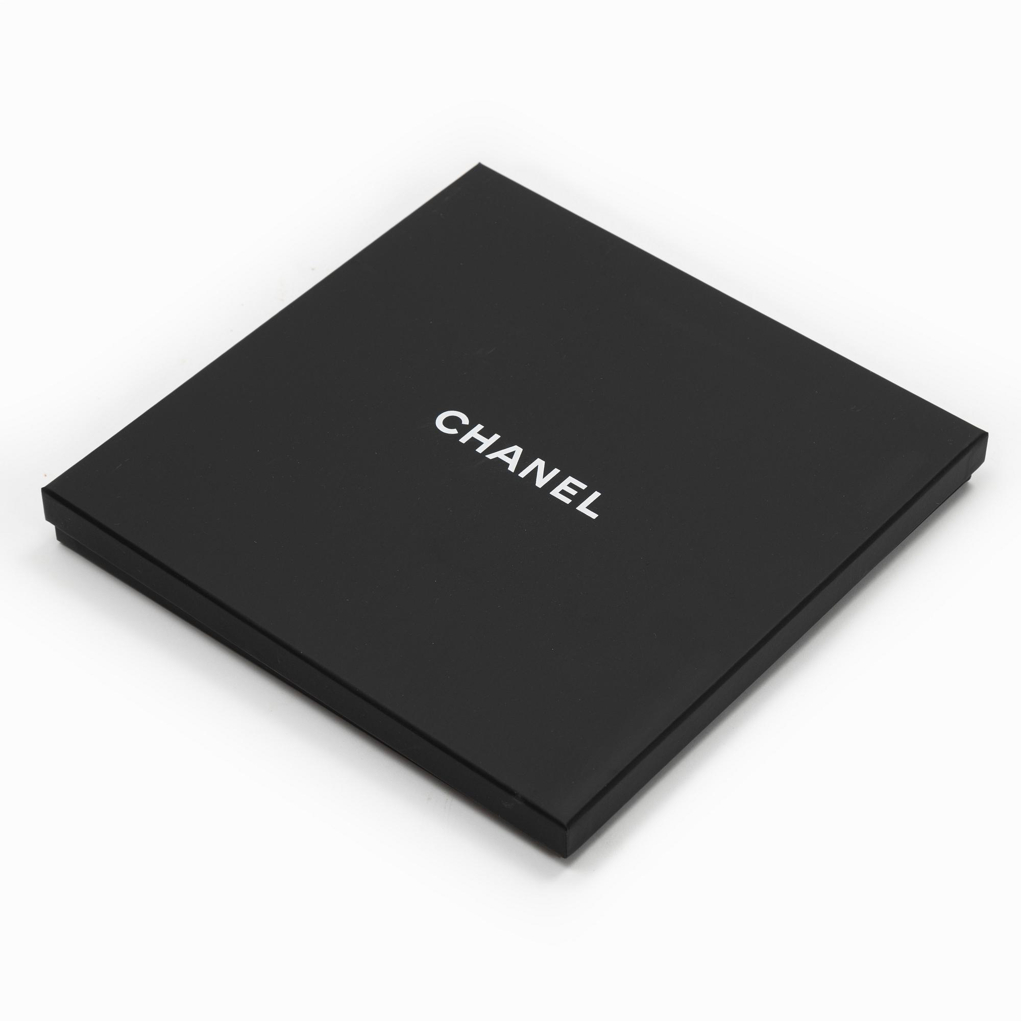 Chanel, a silk scarf.