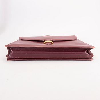 A Cartier leather briefcase.