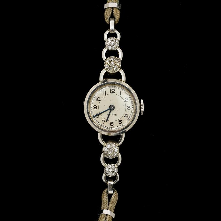 DAMARMBANDSUR, platina med 32 små diamanter, Schweiz, 1900-talets andra hälft. Vikt 10 g.