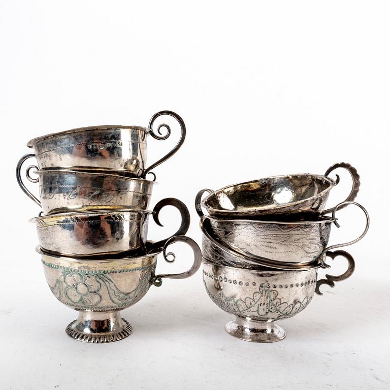 A Swedish 19th century set of eight silver cups, weight 168 grams.