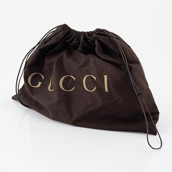 Gucci, clutch.