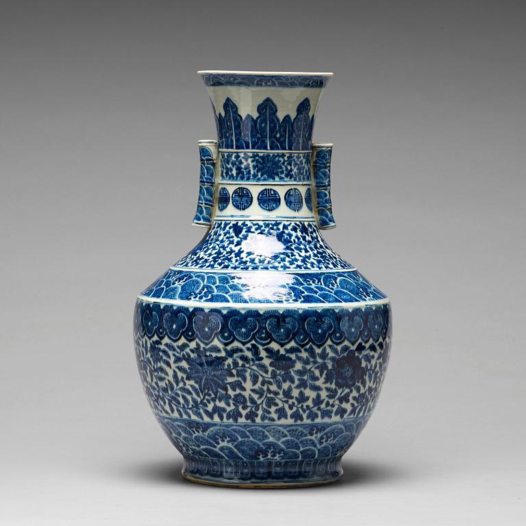 A blue and white vase, late Qing dynasty with Qianlong mark.