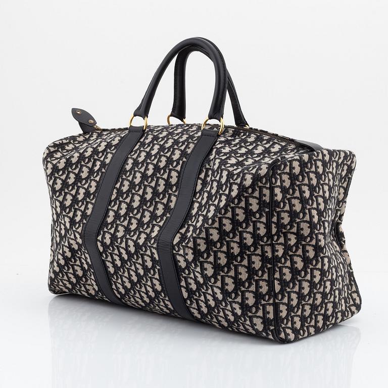 Christian Dior, weekendväska med paraply.
