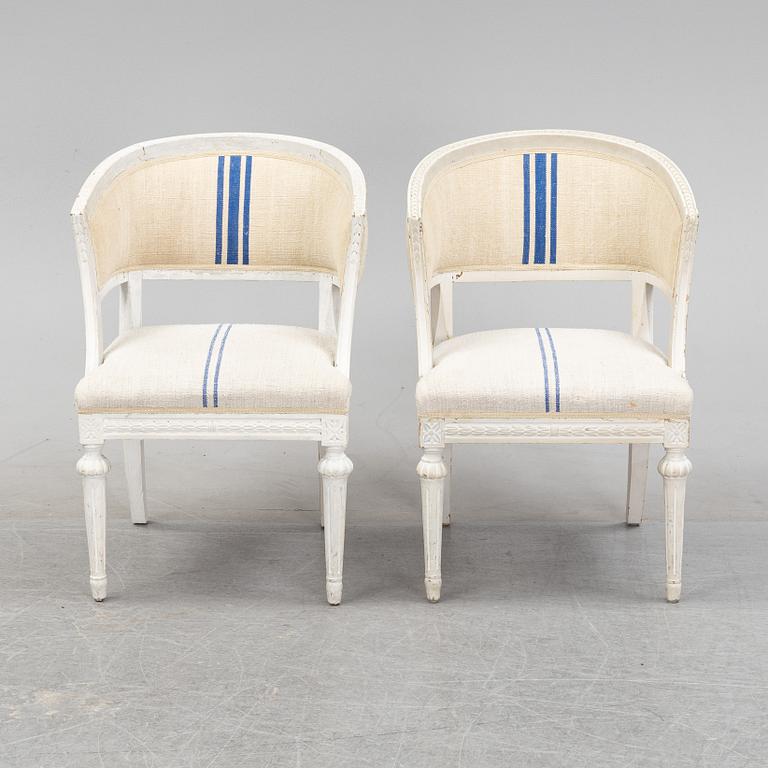 A pair of Gustavian style armchairs from around year 1900.