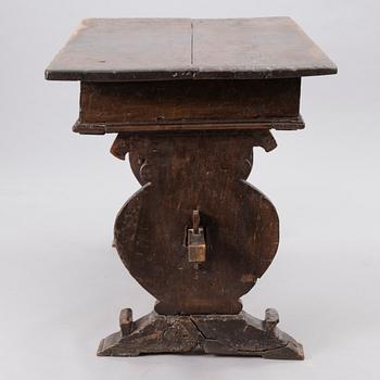 A baroque style wooden table from the 17th/18th Century.