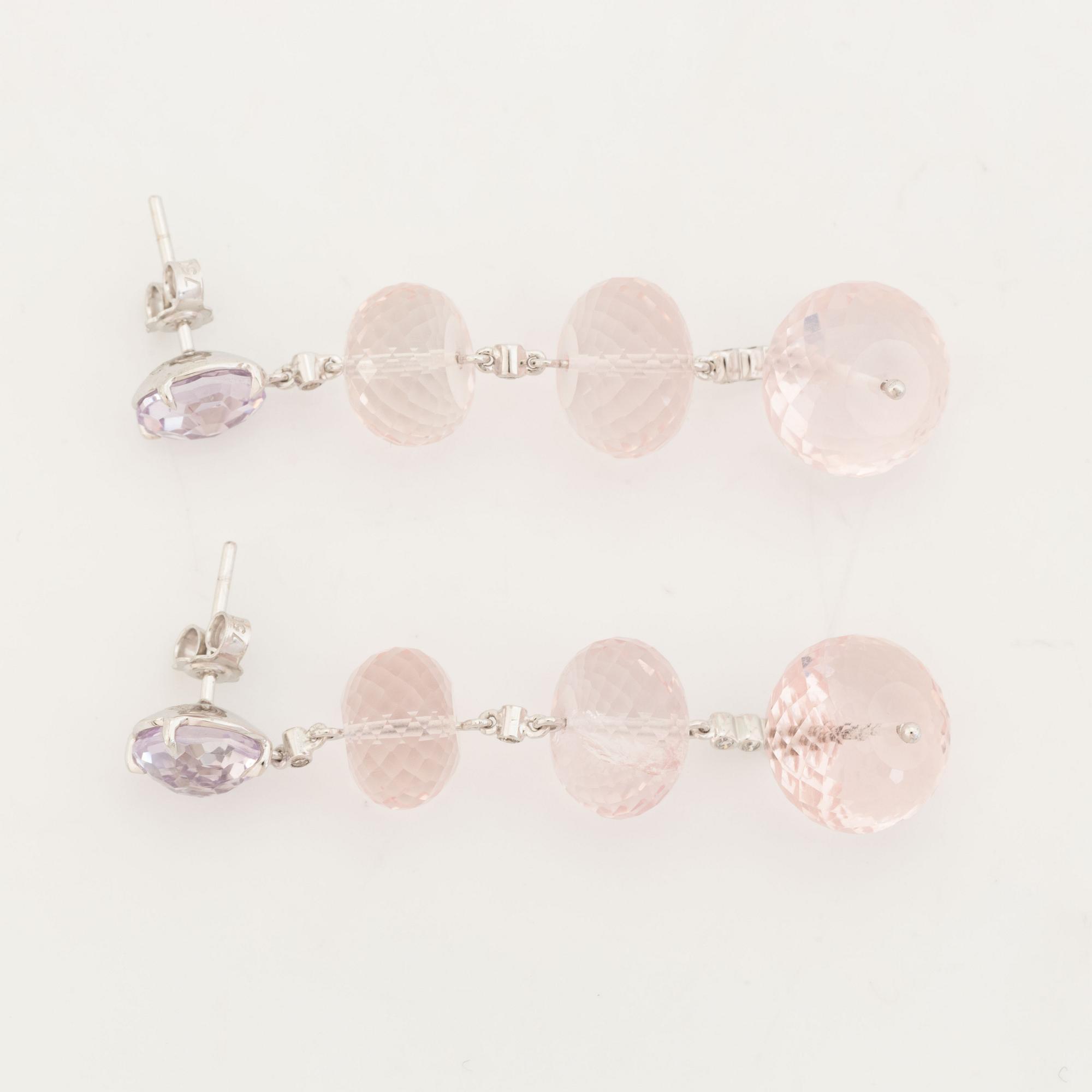 Briolette cut rose quartz and brilliant cut diamond earrings.