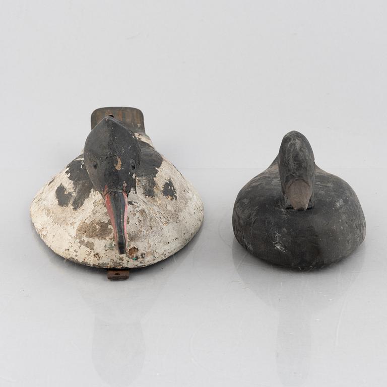 A set of six wooden duck decoys, 20th century.