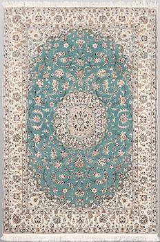 A Nain rug, part silk, so-called 6 LAA, approx. 239 x 160 cm.