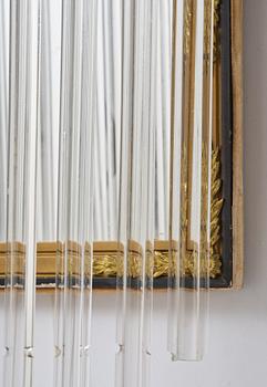 A pair of mirror sconces, 1910's/20's.