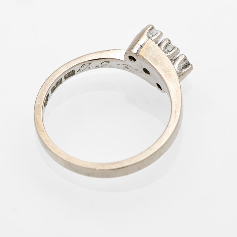 18K white gold ring with diamonds.