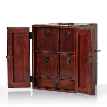 A Chinese hardwood cabinet/medicine chest, Qing dynasty/early 20th century.