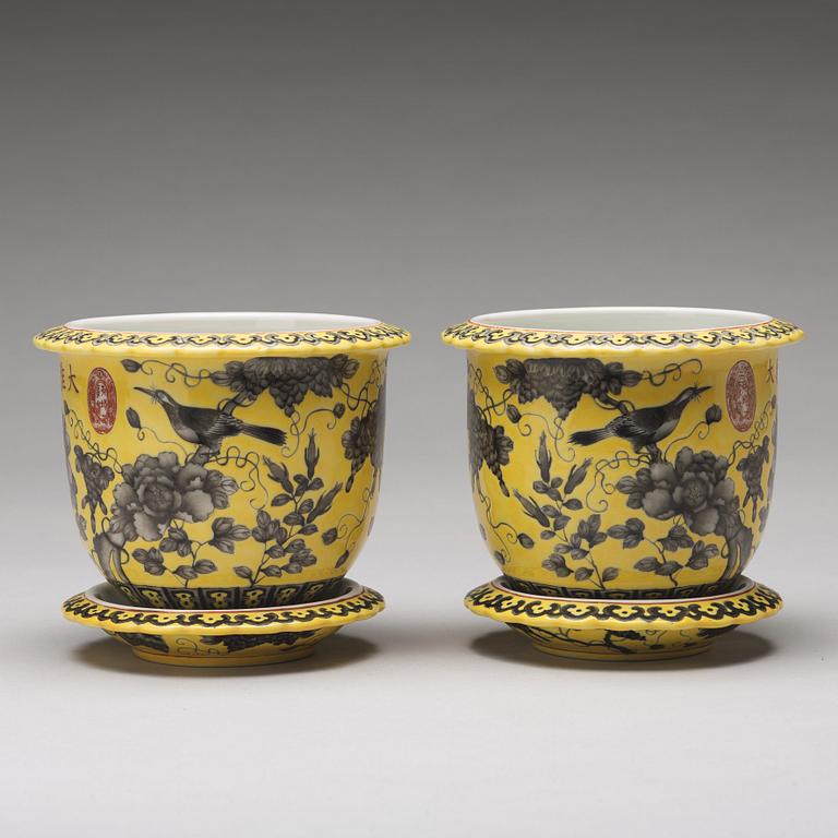 A pair of yellow glazed Dayazhai mark flower pots with stands, Republic, 20th Century.