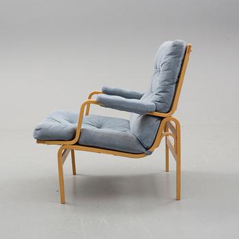 FÅTÖLJ, "Ingrid", Bruno Mathsson för Dux, 1900-talets andra hälft.