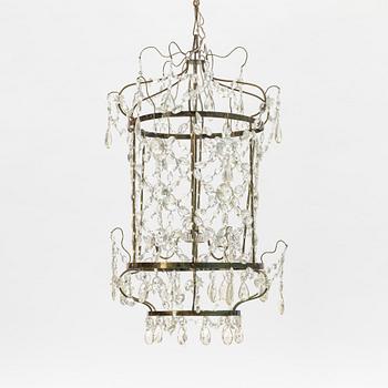 A three-light Gustavian-style hanging light, circa 1900.