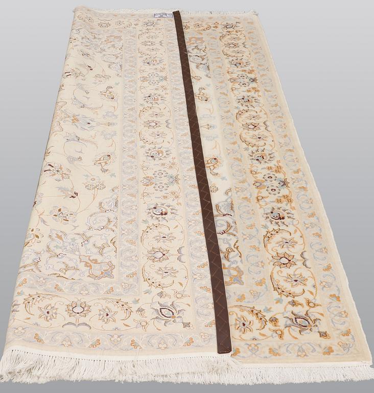 A rug Nain, Part Silk, S.K 9LAA, ca 245 x 160 cm.
