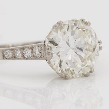 A SOLITAIRE RING with an old-cut diamond 2.56 cts.