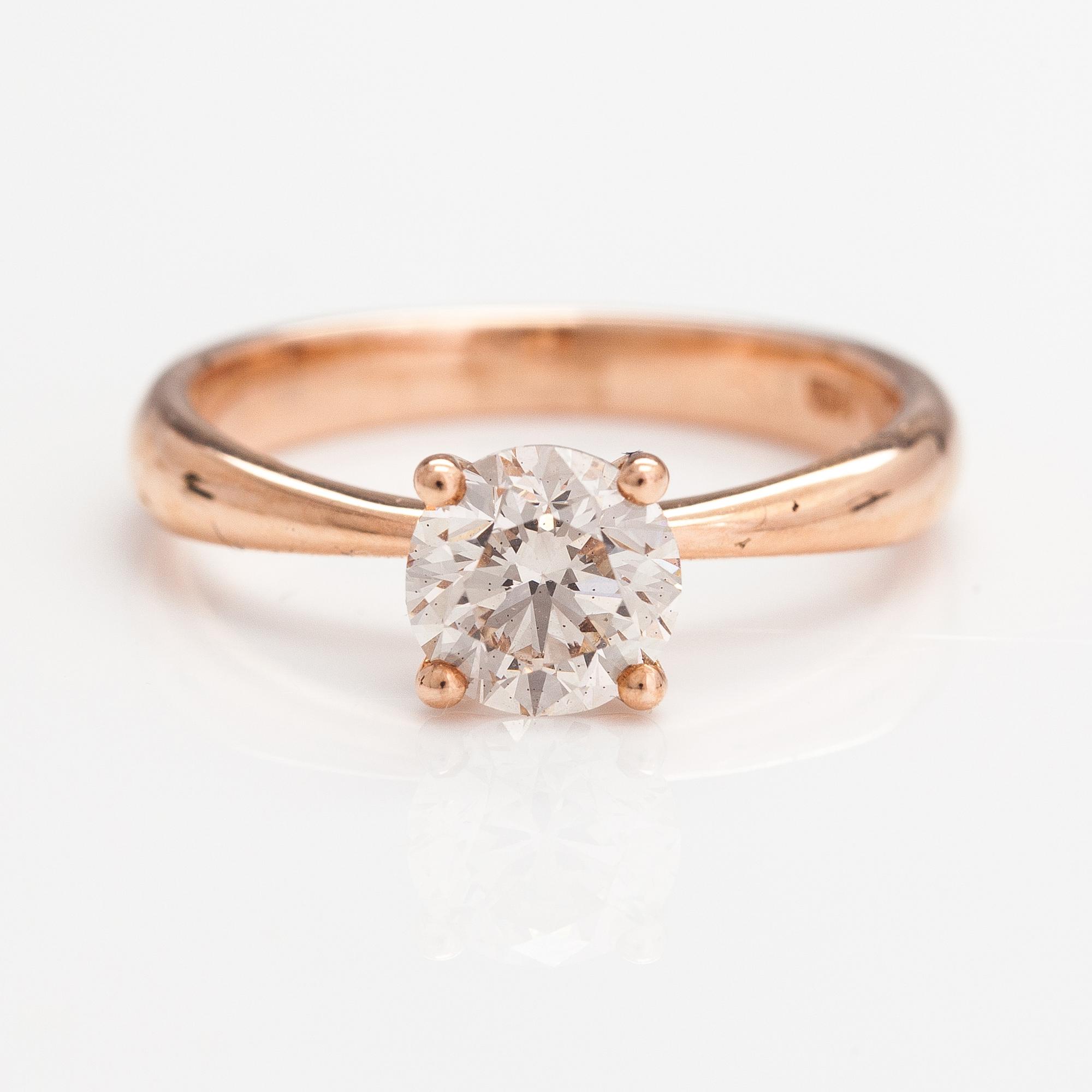 A 14K rose gold ring with a ca. 0.87 ct light brown diamond.
