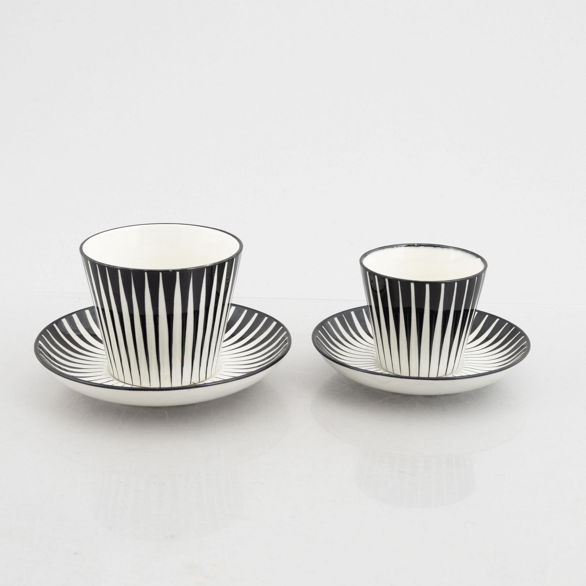 Eugen Trost, three creamware coffee cups with saucers and four tea cups with saucers, "Zebra", Upsala-Ekeby, Sweden.