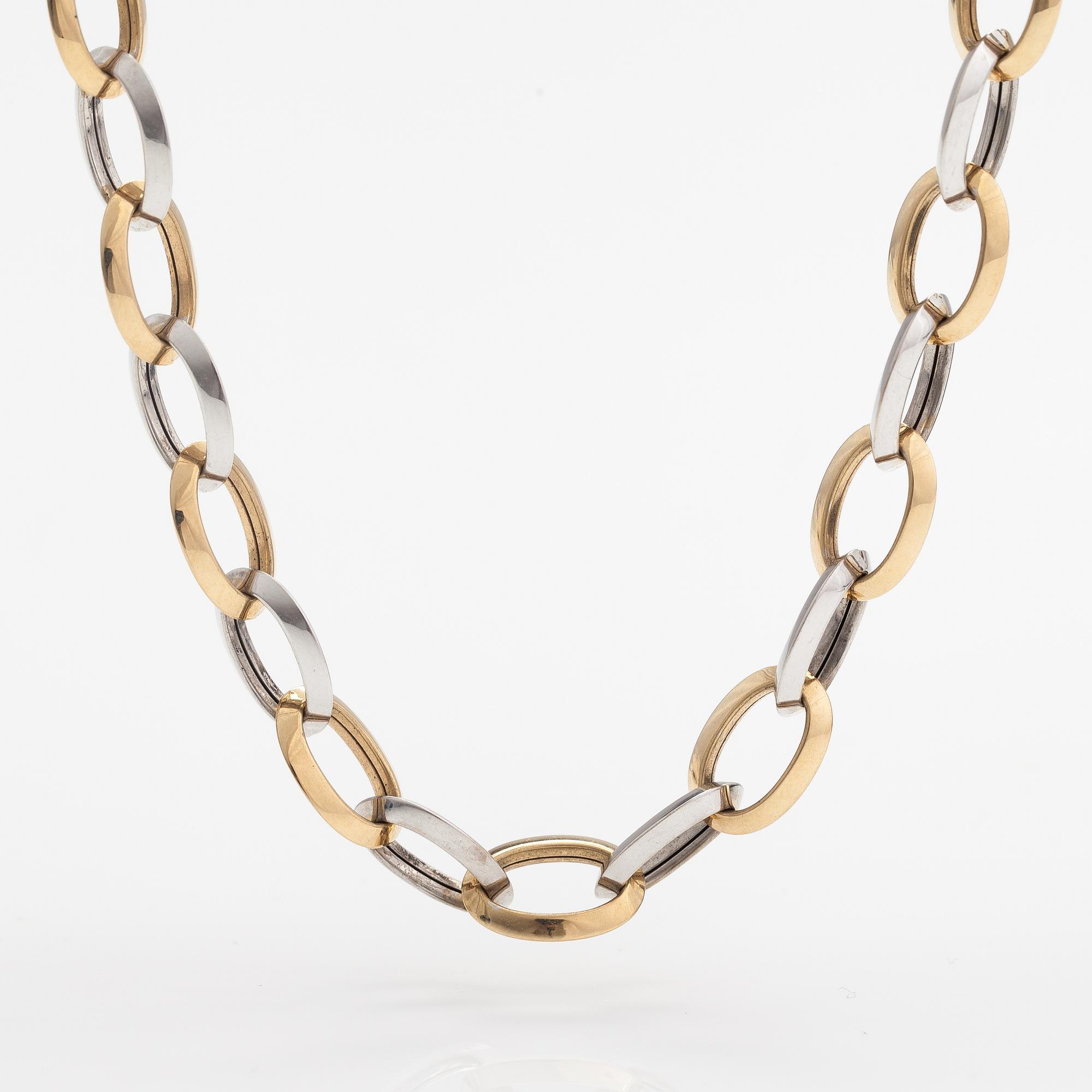 A 14K white and yellow gold necklace.