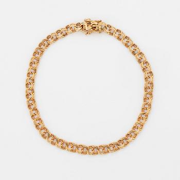 18K gold bracelet.