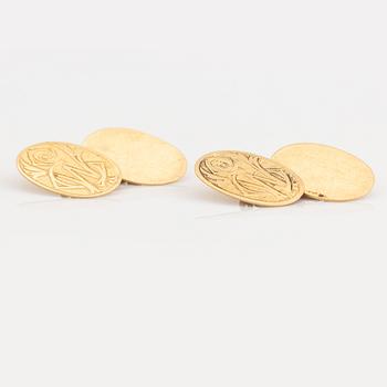 18K gold cufflinks with monogram.