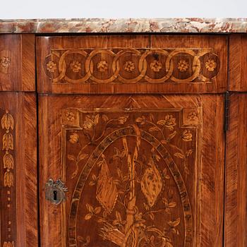 A pair of Louis XVI corner cupboards by Francois Gaspard Teunè (master in Paris from 1766), 18th century.