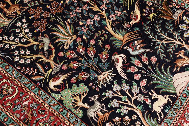 A Tabriz silk rug, approx. 155 x 100 cm.