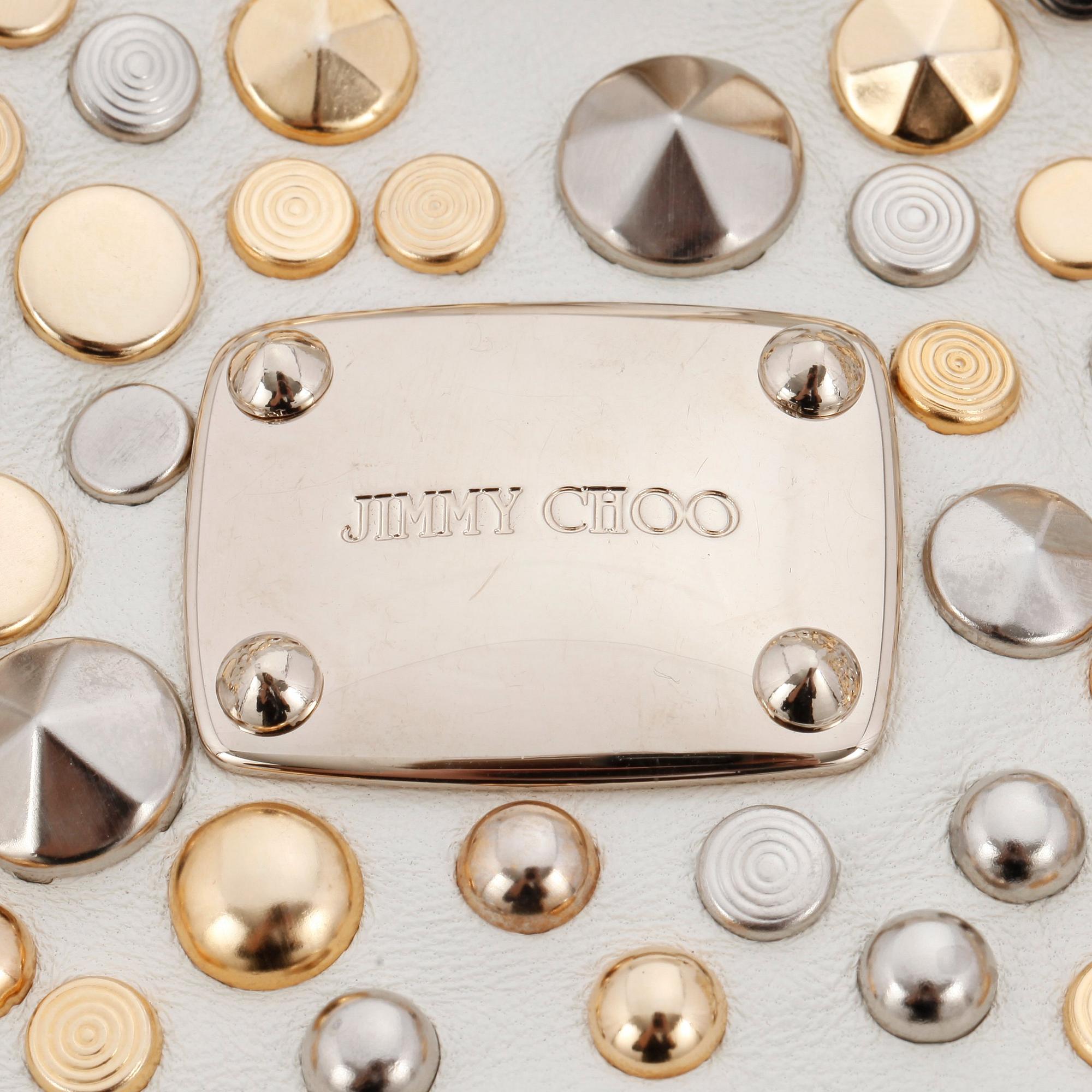 JIMMY CHOO, a white leather handbag with studs.
