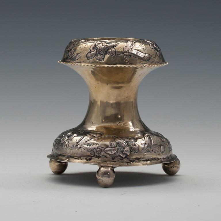 A SALT CELLAR, silver. Holland 18th century. Parcelgilt with chased decorations. Height 10 cm. Weight 100 g.
