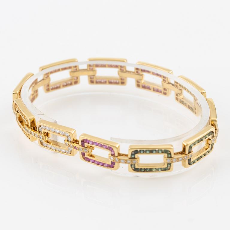 Bracelet 18K gold with sapphires in various colours and round brilliant-cut diamonds.