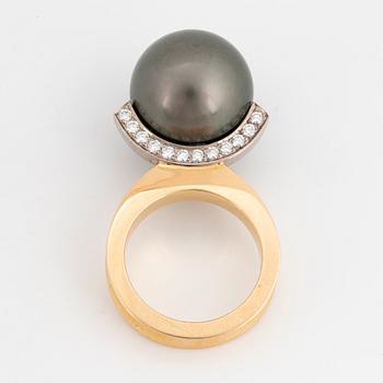 Cultured Tahiti pearl and brilliant-cut diamond ring by Rolf Karlsson.