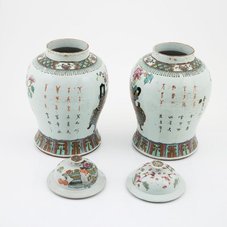 A pair of Chinese lidded urns, late Qing dynasty, around the year 1900.